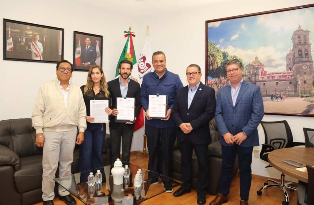 Convenio de Colaboración entre el IAP Puebla y el Instituto Poblano de Asistencia al Migrante